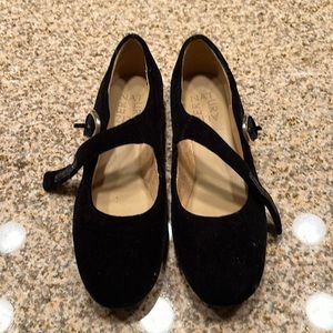Flat Mary Jane’s. Black velvet. Got a size too small. Never worn.